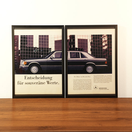 Original vintage Mercedes-Benz S-Class W126 advertisement framed in black aluminum. Two-piece wall art set showing the side profile of a dark grey luxury sedan with the German headline 'Entscheidung für souveräne Werte'.