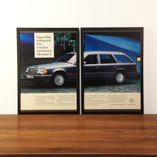 Original vintage Mercedes-Benz T-Model estate advertisement framed in black aluminum. Two-piece wall art set showing a silver Mercedes station wagon with the German headline 'Eigenwillig. Erfolgreich. Gut. Und jetzt noch besser.