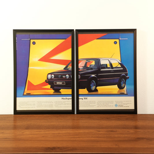 Original vintage Volkswagen Golf 2 GTI 16V advertisement framed in black aluminum. Two-piece wall art set featuring a black GTI on a bright yellow background with red lightning bolt graphics and the German headline 'Hochspannung 16V'.